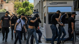 Greek magistrates grill suspects over fan killing