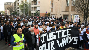 Hundreds march in Paris suburb after youth killed in police chase