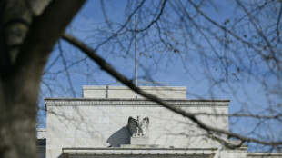 Asian markets mixed after Fed official floats rate cut delay