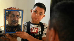 Childhood cut short: Honduran boy, 12, wielding barber's shears