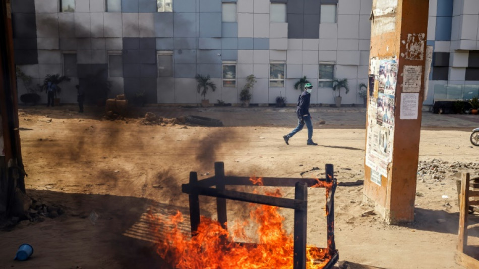 Police and protesters clash after Senegal election postponed