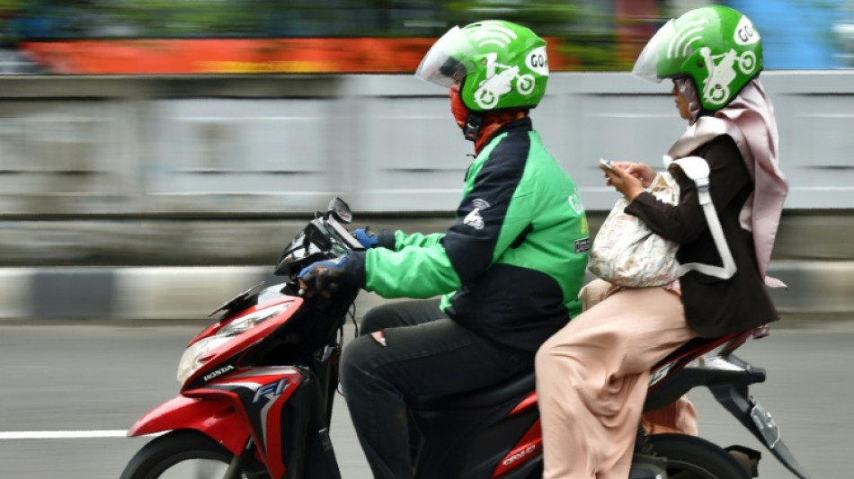 Indonesian gig drivers fear hardship after fuel price hike