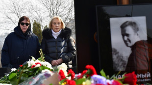 Navalny's mother visits grave after funeral draws thousands