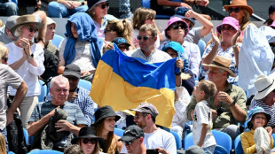 Ukrainian teen criticised for shaking Russian player's hand at Australian Open