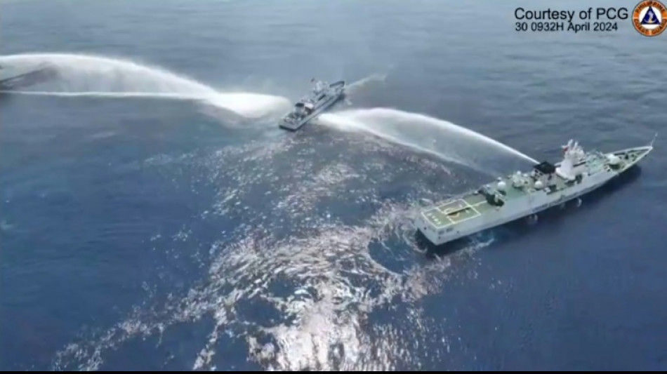 Philippines says China Coast Guard used water cannon on its vessels