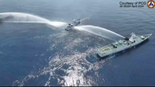 Philippines says China Coast Guard used water cannon on its vessels