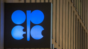 Oil drops further after OPEC delay with Asian stocks mixed