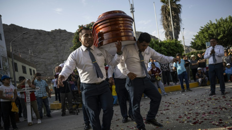 Peru's dancing undertakers take sting out of death