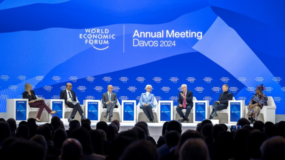 Davos free-trade champions fret over war, climate