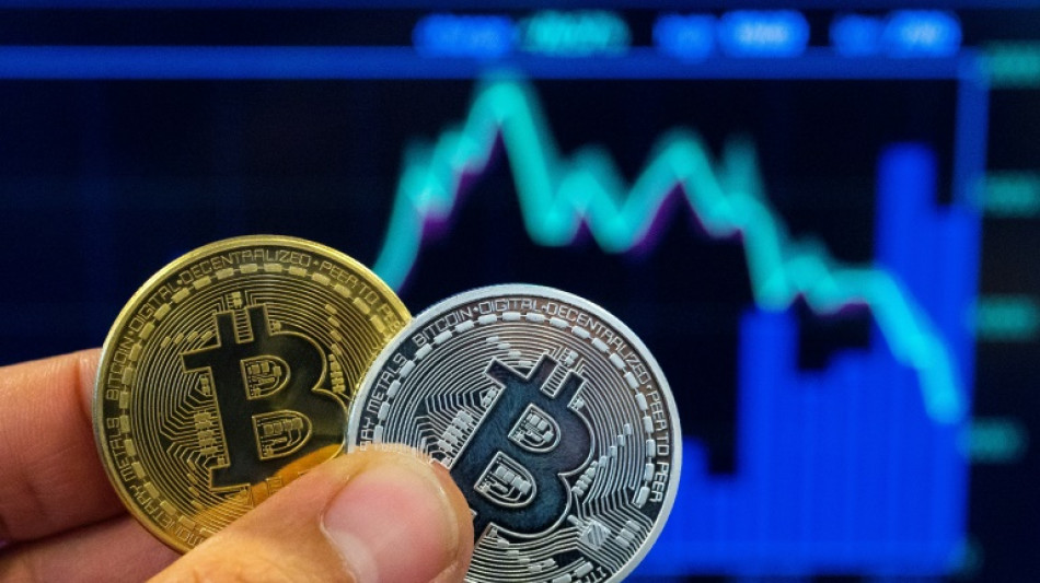 Stocks drop as bitcoin hits fresh record high