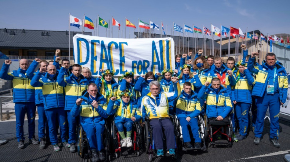 Tears, defiance as Ukraine Paralympics team honour country's fallen