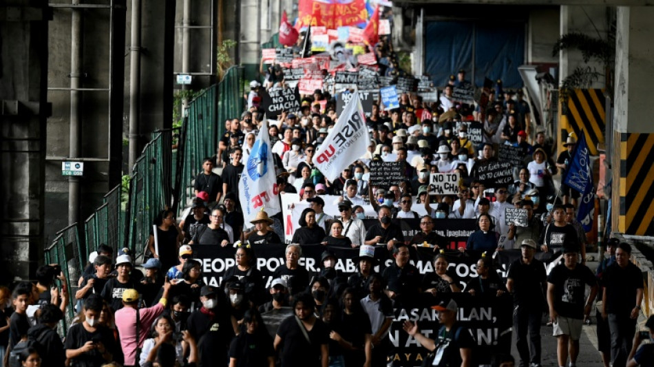 Philippine protesters say 'never again' on anniversary of anti-Marcos uprising