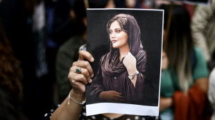 Iran security forces open fire as thousands mourn Mahsa Amini