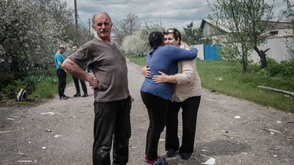 Tearful goodbyes in Ukraine town as Russian forces approach