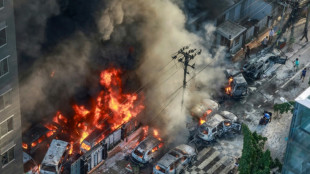 Bangladesh capital bans rallies after government buildings torched