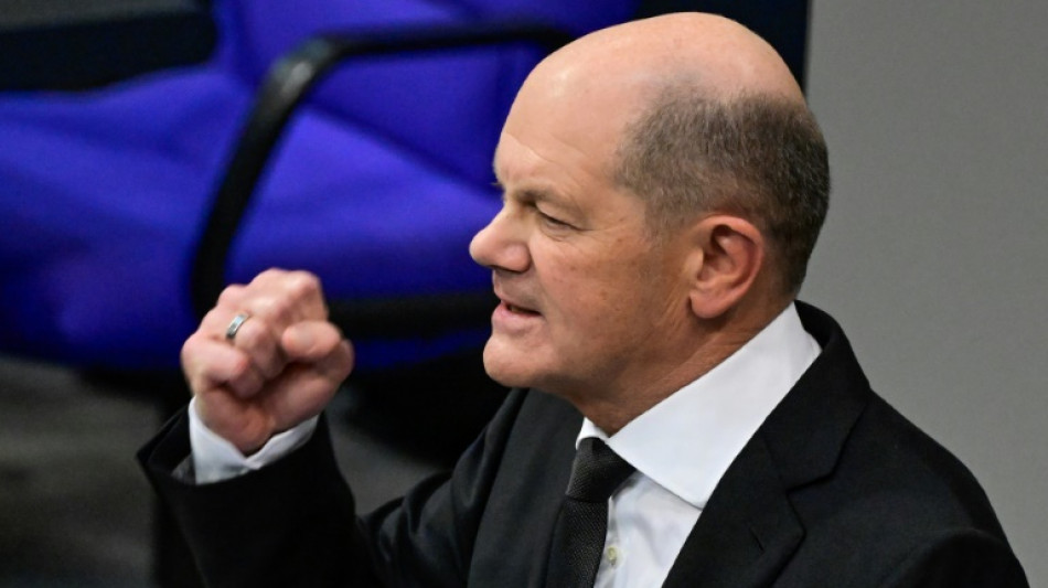 Scholz vows to do all for 'huge' EU aid for Ukraine