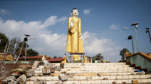 Myanmar villagers pick through rubble of homes devastated by war