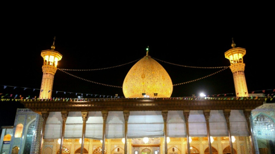 Iran hangs two in public over Shiraz shrine shooting