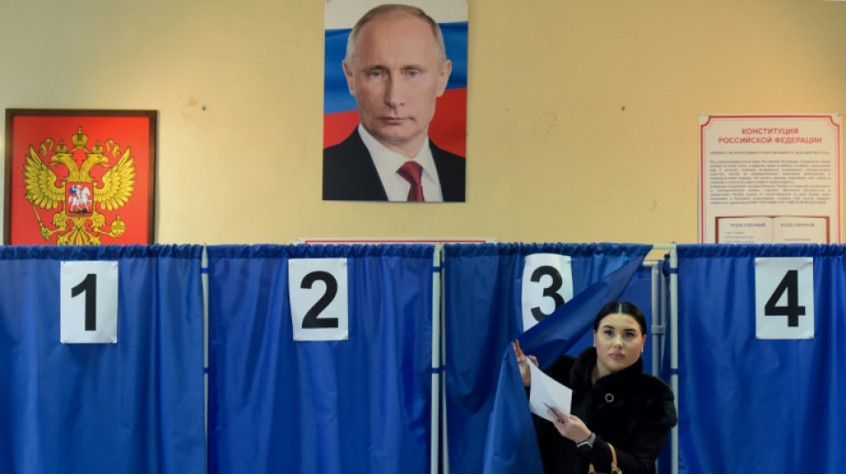 Russia hails 'record' win for Putin in vote with no opposition