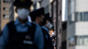 Three killed, including two police, in Japan gun and knife attack