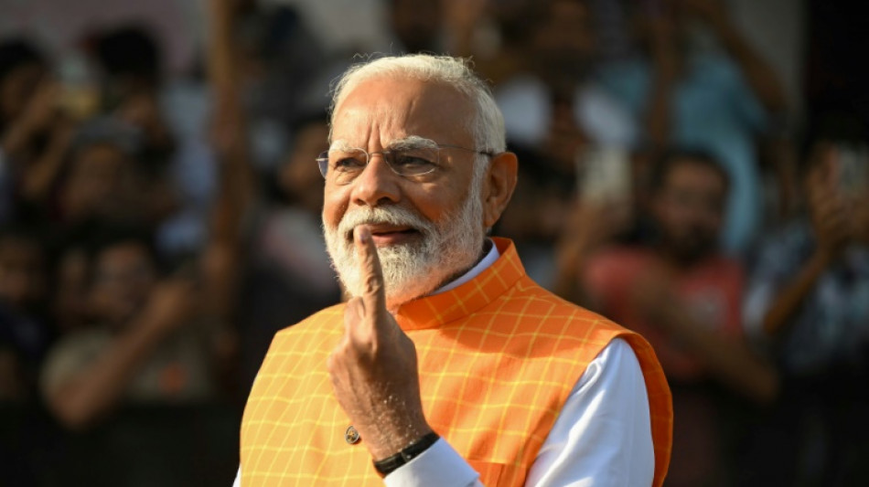 Modi: tea seller's son who became India's populist hero