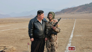 North Korean leader Kim oversees paratroop drills 