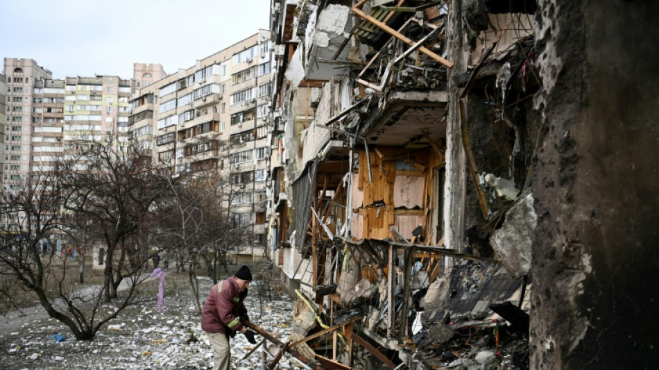 Ukrainian and Russian troops fight on streets of capital Kyiv