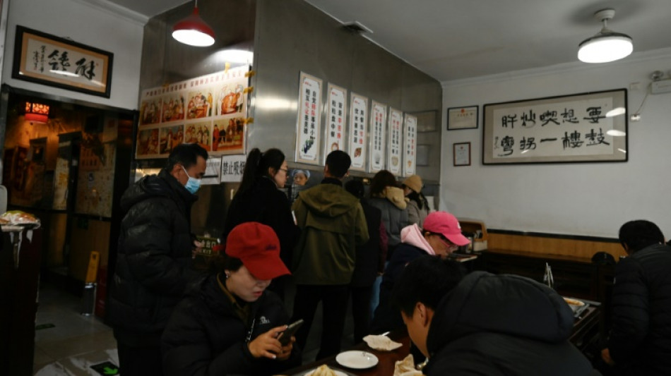 At Biden's 'noodle diplomacy' eatery, Chinese eye warming US ties