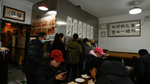 At Biden's 'noodle diplomacy' eatery, Chinese eye warming US ties