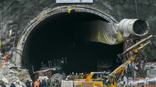 India rescuers make painstaking progress towards 41 trapped in tunnel