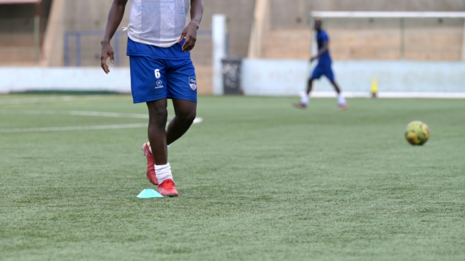 Young Senegalese football lovers flock to artificial turf