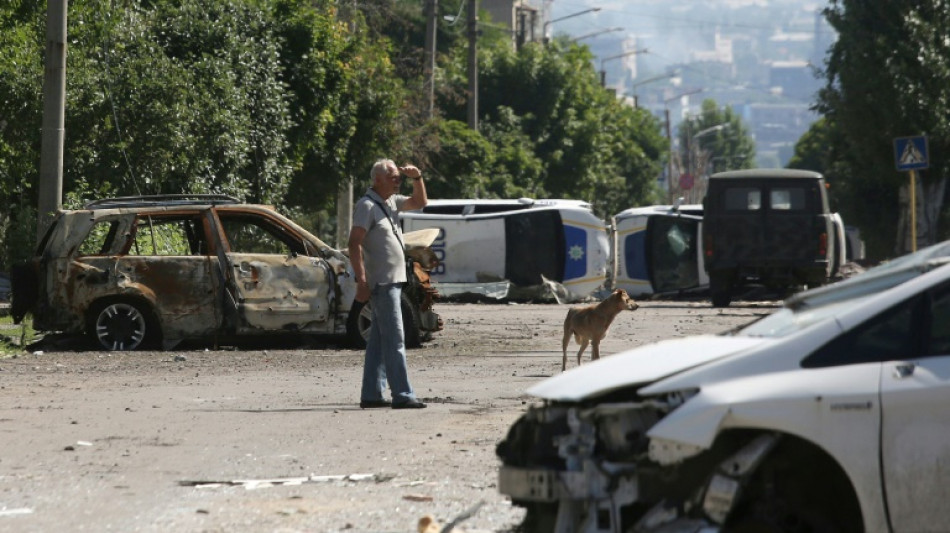 Battered Lysychansk clings on as Russians advance