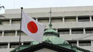 Yen drops, stock markets mixed as Japan hikes interest rates