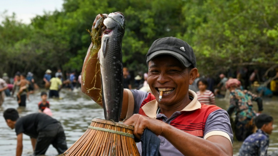 Cambodians celebrate traditional fishing methods at annual ceremony