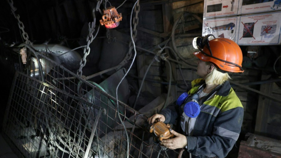 With men on the front, women descend Ukraine's mines