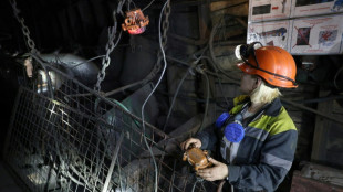 With men on the front, women descend Ukraine's mines