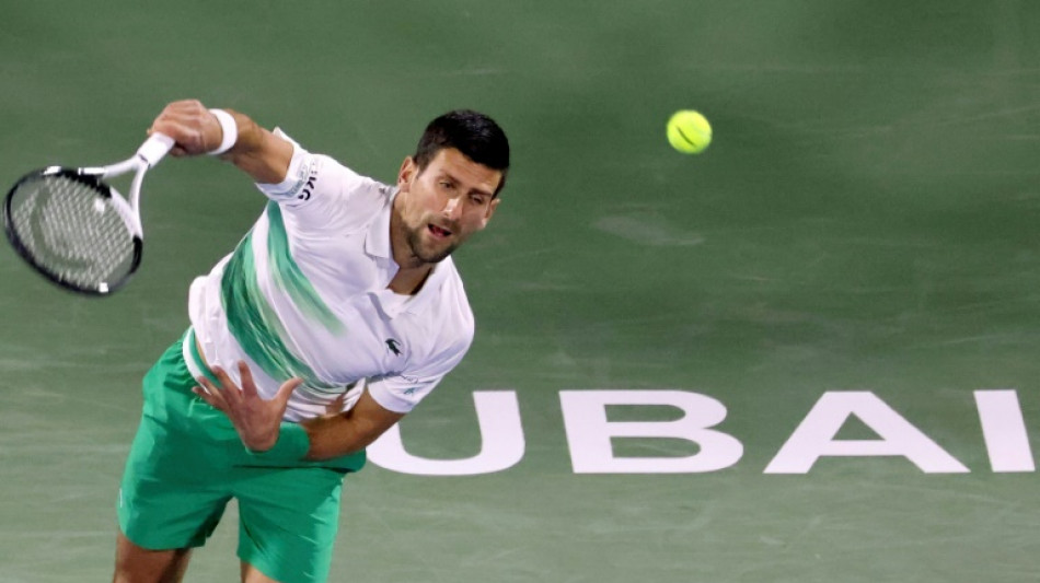 Business as usual as Djokovic reaches 10th successive quarter-final