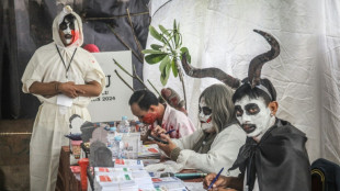 From remote tribal areas to flooded cities, Indonesians go to polls