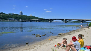 Ukrainians look to Kyiv beaches as respite from war