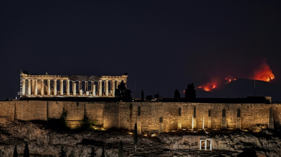 Athens district evacuated as Greek fire death toll hits 20