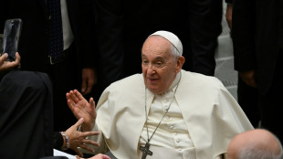 Pope dismisses US bishop who was prominent critic