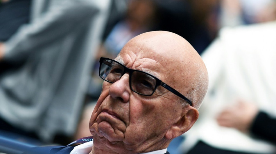 Media mogul Murdoch says he'll stay 'active' after passing torch