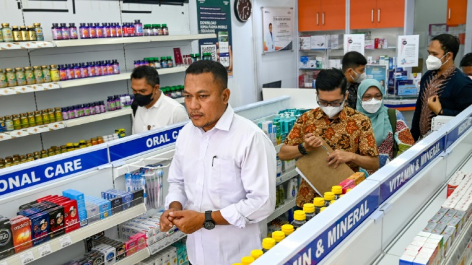 Indonesia revokes licences of drug firms over syrups linked to child deaths