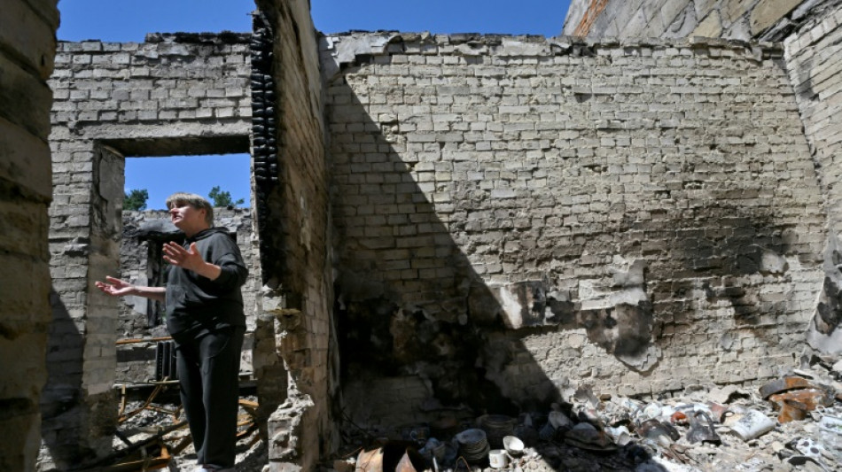 In Ukraine's 'martyr towns', hopes for speedy reconstruction