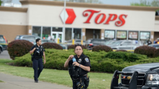 US mourn victims of racist mass shooting at store