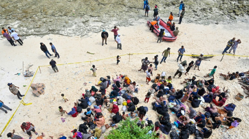 Huddled on an Indonesian beach, stranded Rohingya plead for mercy