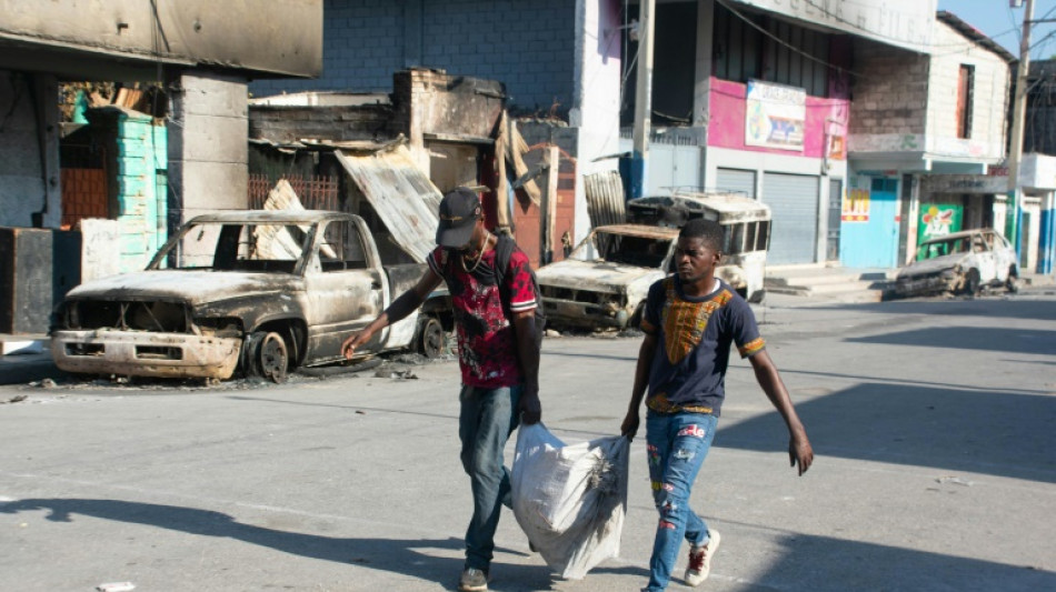 Haiti works at govt transition as gang leader vows to fight on