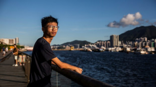 Hong Kong democracy advocate seeks asylum in Britain