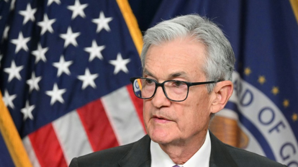 US Fed holds key rate, still sees 3 cuts in 2024