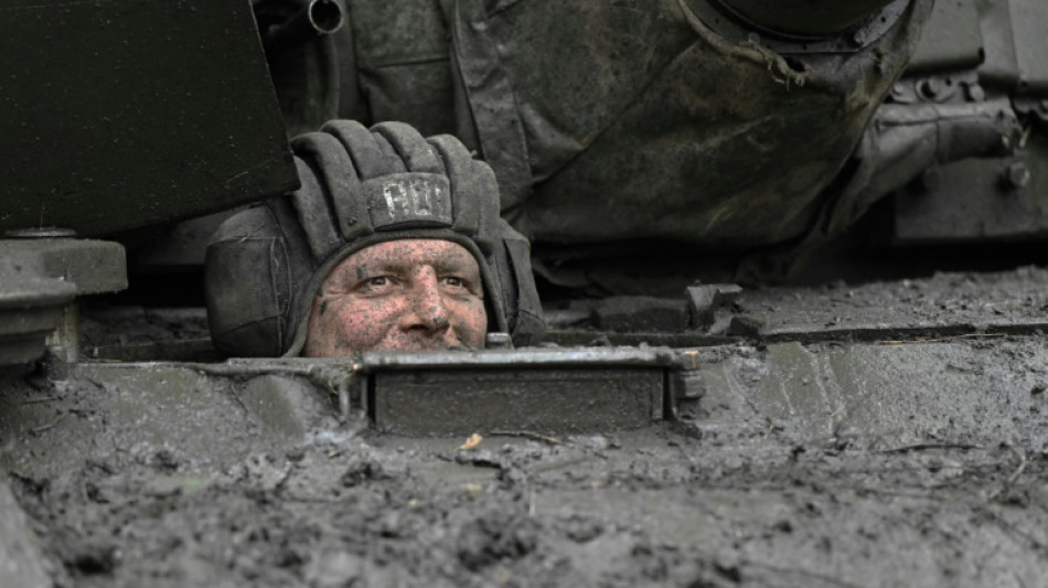 Ukraine troops bristle at rumours of chief's possible firing